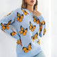 TrendiStyles Butterfly Pattern Round Neck Dropped Shoulder Sweater 🦋