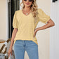 Full Size Eyelet Puff Sleeve V-Neck Top