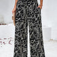 Smocked Printed Wide Leg Pants with Pockets