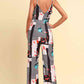 White Printed Spaghetti Strap Tied Jumpsuit
