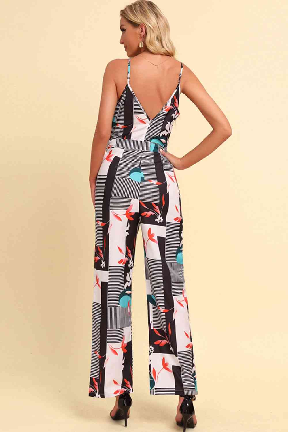 White Printed Spaghetti Strap Tied Jumpsuit