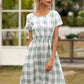 Smocked Plaid Round Neck Short Sleeve Dress