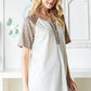 Heimish Full Size Animal Print Half Button Short Sleeve Top