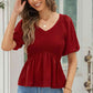 Smocked Balloon Sleeve Peplum Blouse