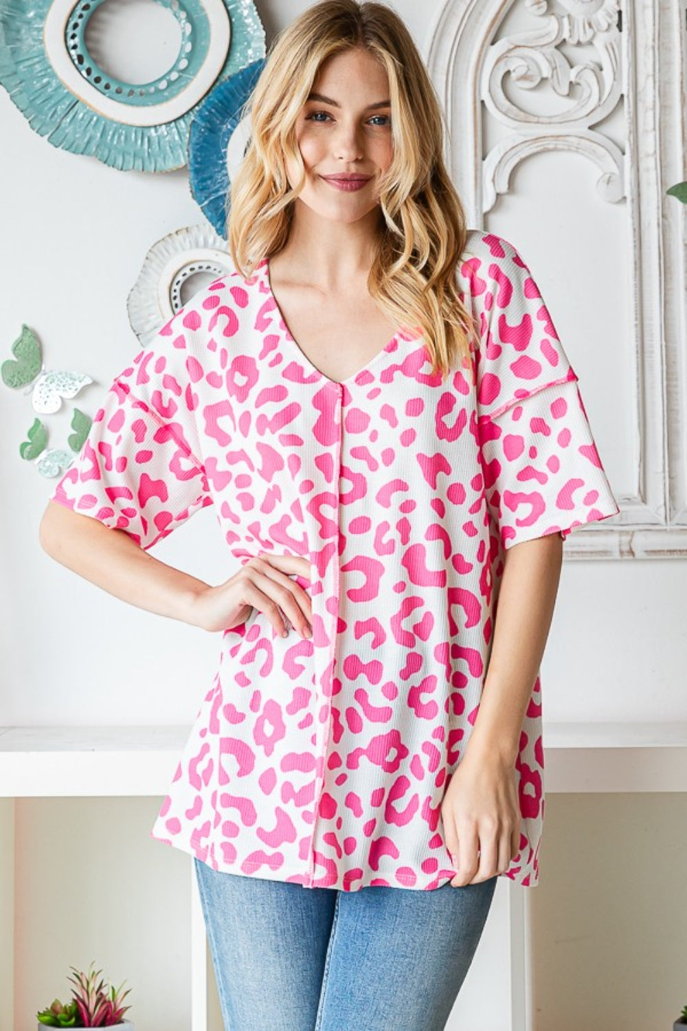 Heimish Full Size Leopard Exposed Seam Short Sleeve Top *