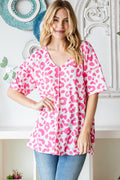 Heimish Full Size Leopard Exposed Seam Short Sleeve Top *