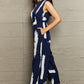 Navy Blue Printed Round Neck Cutout Jumpsuit with Pockets
