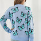 TrendiStyles Butterfly Pattern Round Neck Dropped Shoulder Sweater 🦋
