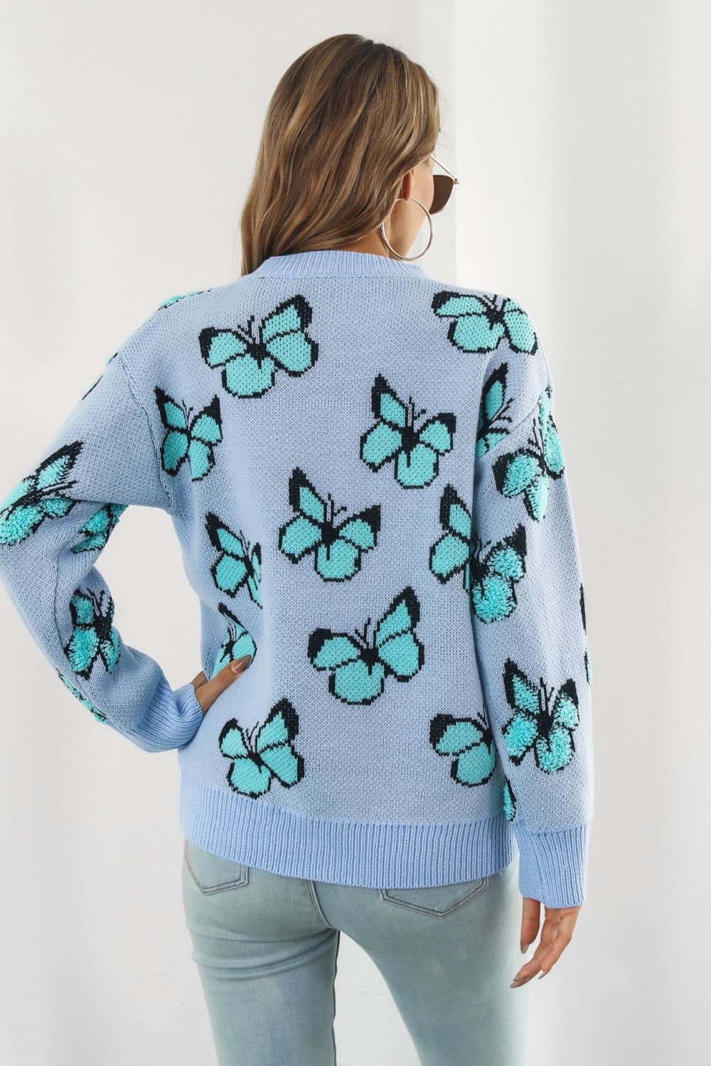 TrendiStyles Butterfly Pattern Round Neck Dropped Shoulder Sweater 🦋