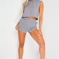 Women's Full Size Hooded Crop Top & Pocketed Shorts Set