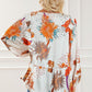 White Printed V-Neck Smocked Balloon Sleeve Blouse