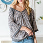 Heimish Full Size Leopard Contrast V-Neck Half Sleeve T-Shirt