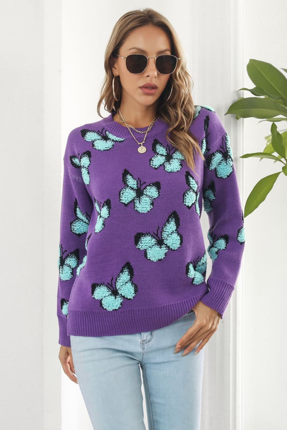 TrendiStyles Butterfly Pattern Round Neck Dropped Shoulder Sweater 🦋