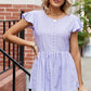 Tied Ruffled Round Neck Peplum T-Shirt