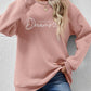 FOLLOW YOUR DREAMS Graphic Sweatshirt