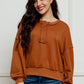 Exposed Seam Half Button Long Sleeve Sweatshirt