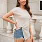 LOVEN'SWEETNESS Full Size Waffle-Knit Twisted Round Neck Short Sleeve Blouse
