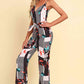 White Printed Spaghetti Strap Tied Jumpsuit