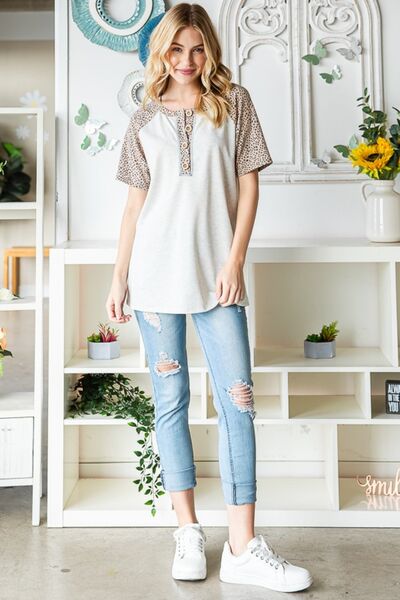 Heimish Full Size Animal Print Half Button Short Sleeve Top *