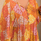 Plus Size Floral Tie Neck Balloon Sleeve Romper