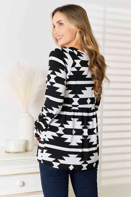 Heimish Full Size Geometric Notched Neck Long Sleeve Top *