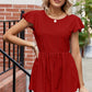 Tied Ruffled Round Neck Peplum T-Shirt