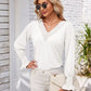 Smocked V-Neck Long Sleeve Blouse