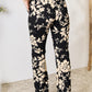 Heimish Full Size High Waist Floral Flare Pants
