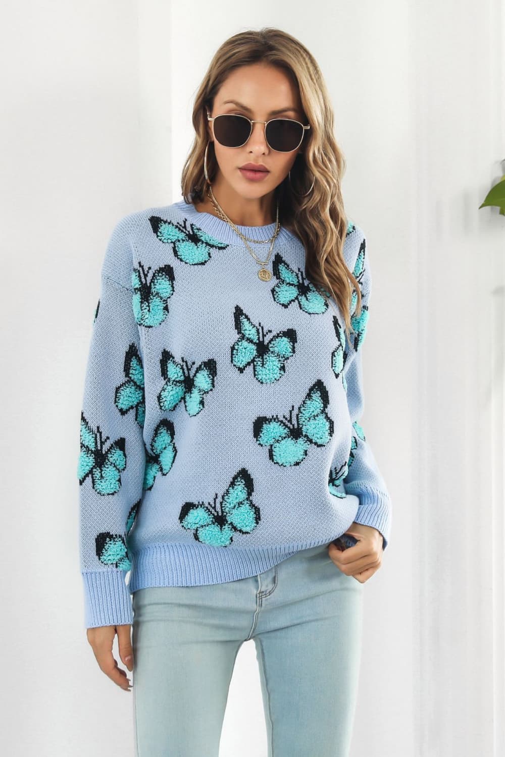 TrendiStyles Butterfly Pattern Round Neck Dropped Shoulder Sweater 🦋