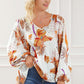 White Printed V-Neck Smocked Balloon Sleeve Blouse