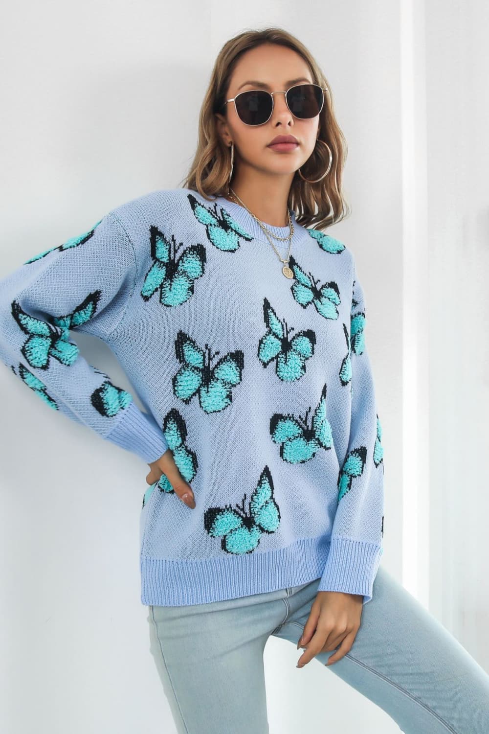 TrendiStyles Butterfly Pattern Round Neck Dropped Shoulder Sweater 🦋