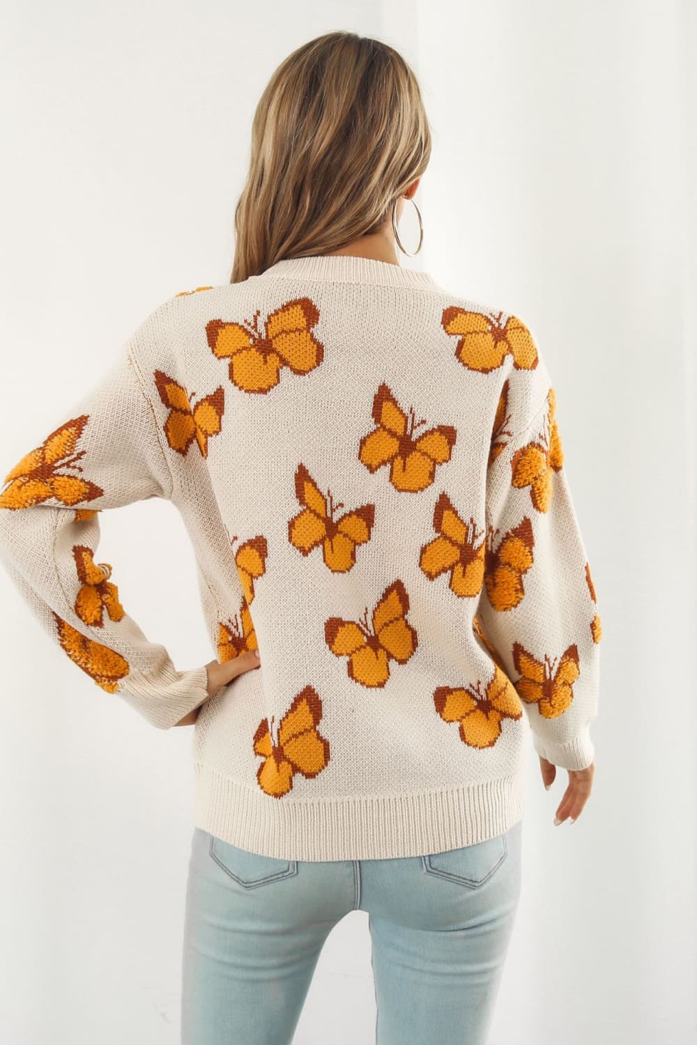 TrendiStyles Butterfly Pattern Round Neck Dropped Shoulder Sweater 🦋